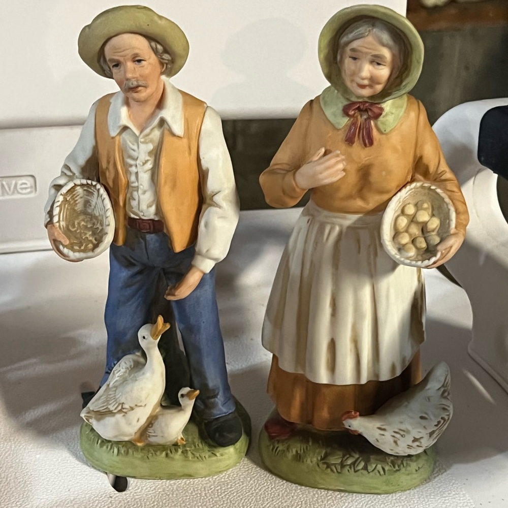 Set of 4 plus one larger old man figurine